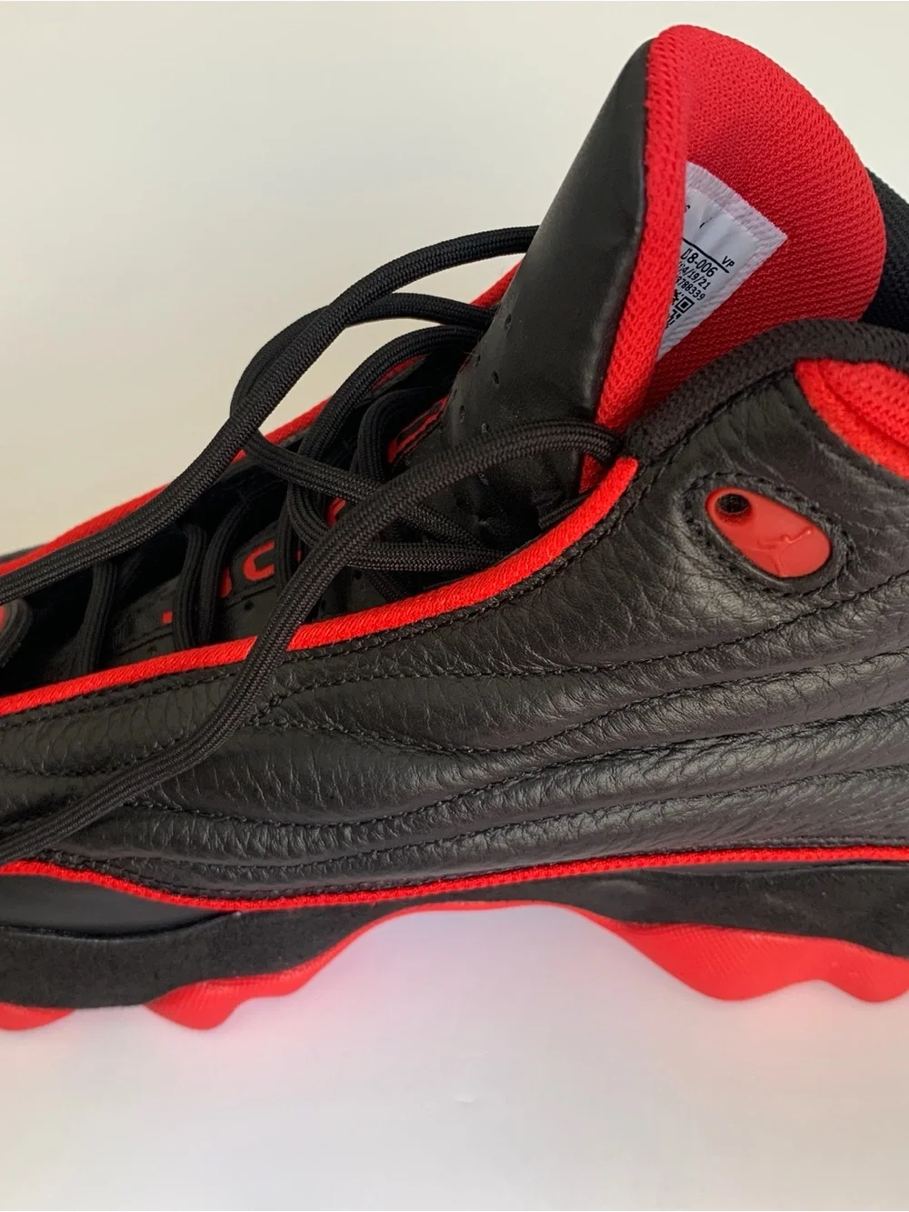Jordan High-Top Sneakers in Black and Red